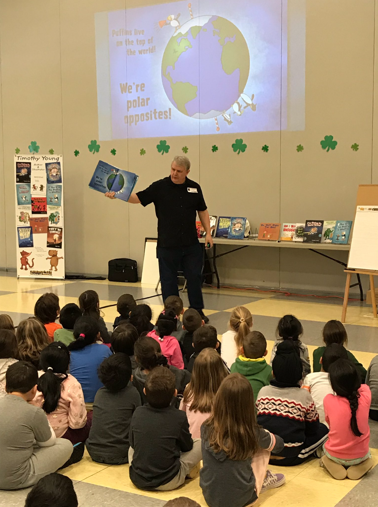 Author/illustrator Timothy Young reads his book The Angry Little Puffin at an author visit assembly.