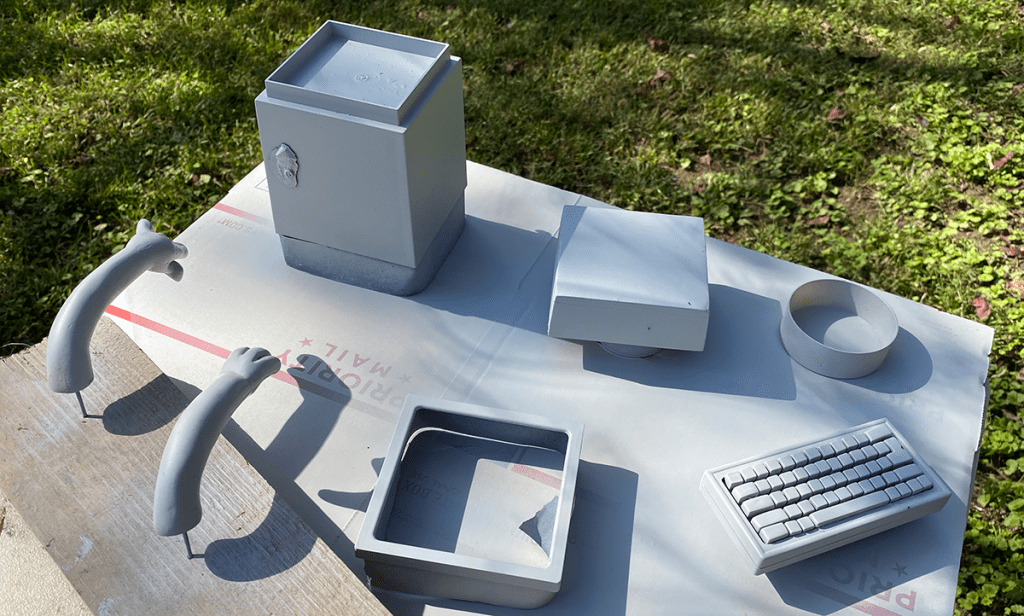 The painted parts of the computer for the restoration of Illustrator Timothy Young's Computer Virus 3D illustration.