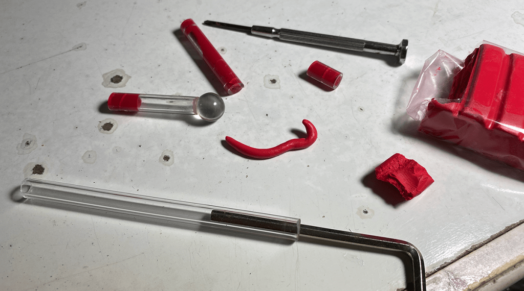 The parts of the broken original thermometer for Illustrator Timothy Young's Computer Virus 3D illustration.